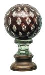 Pinha globular francesa, em cristal incolor e rubi,lapidada em pequenos gomos escavados com elementoestrelar ao topo. Base em bronze. Alt. 17,5 cm